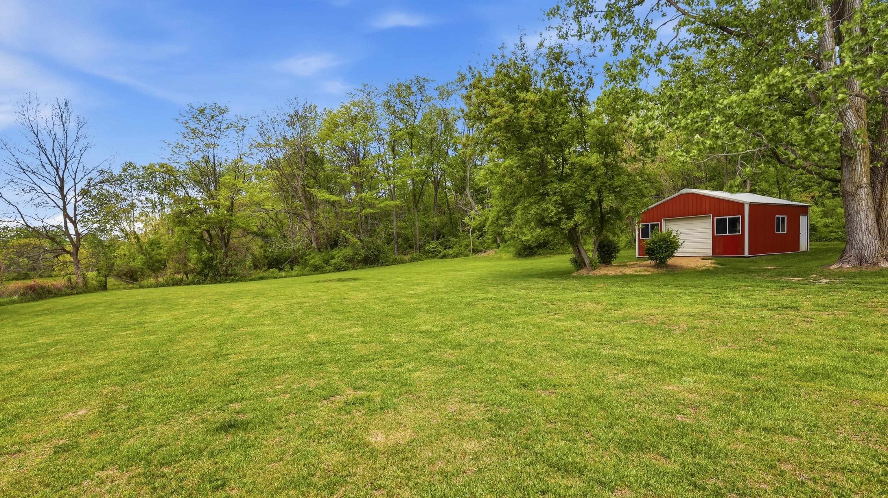 2562 West Blackjack Road Galena, IL 61036 - Photo 64 of 75 a house view with swimming pool in front of it
