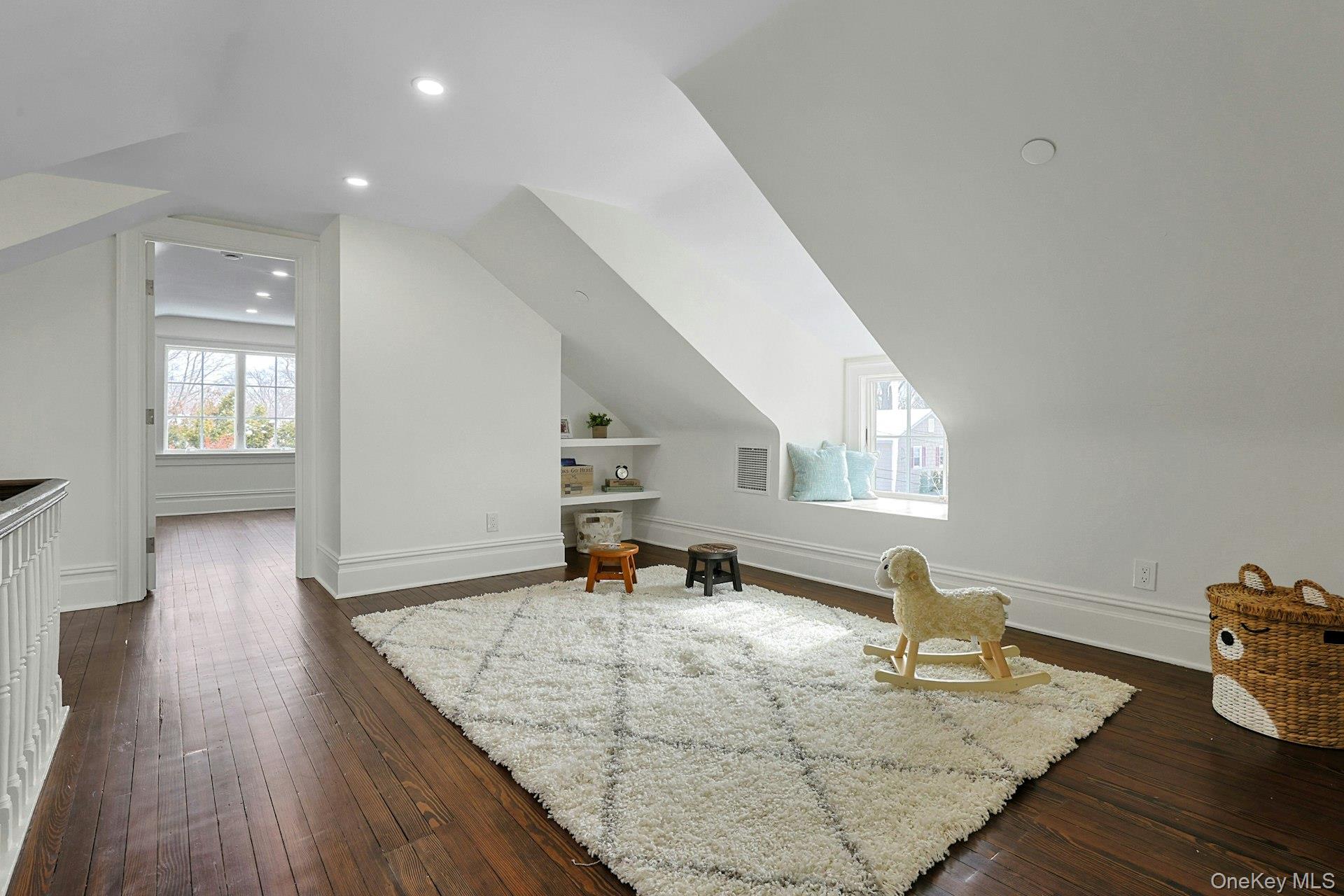 5 Henry Street Tuckahoe, NY 10707 - Photo 25 of 34 Enter the bright third floor with multiple spaces for a playroom, rec room, office and bedroom. Custom built in shelving.