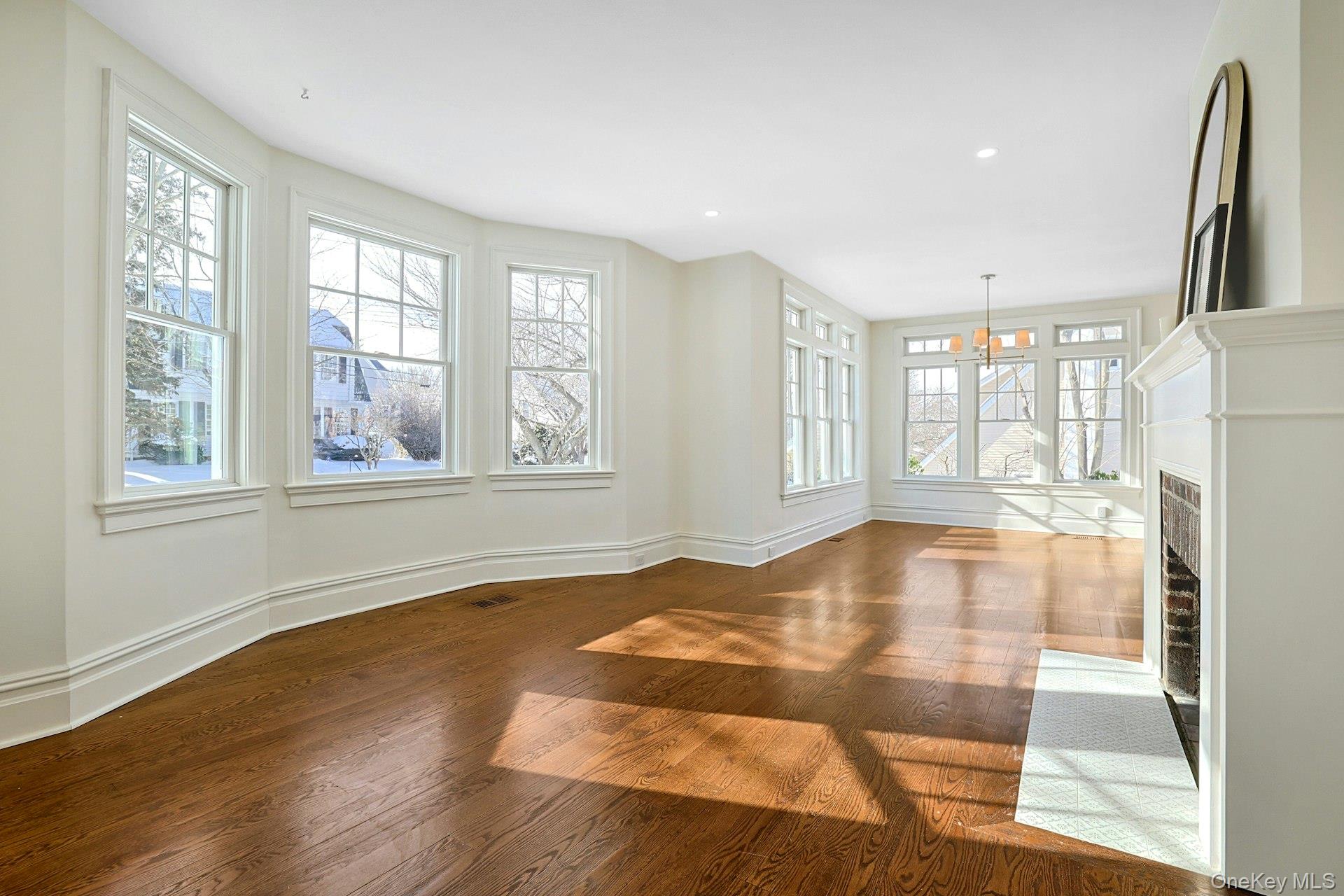 5 Henry Street Tuckahoe, NY 10707 - Photo 3 of 34 The sun pours right in to your living room featuring beautiful new hardwood floors, oversized windows and moldings.