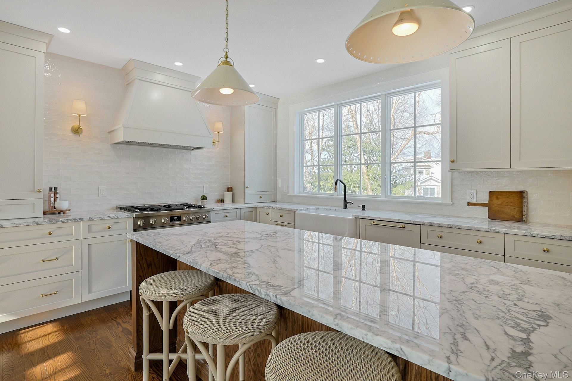 5 Henry Street Tuckahoe, NY 10707 - Photo 8 of 34 Elegant marble countertops with oversized kitchen sink window and top of the line finishes.