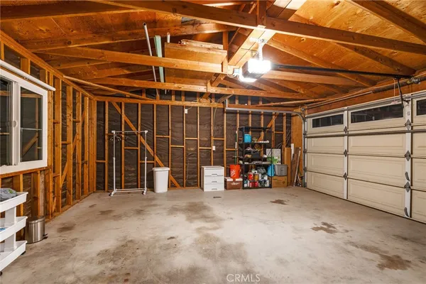 a view of a garage with storage
