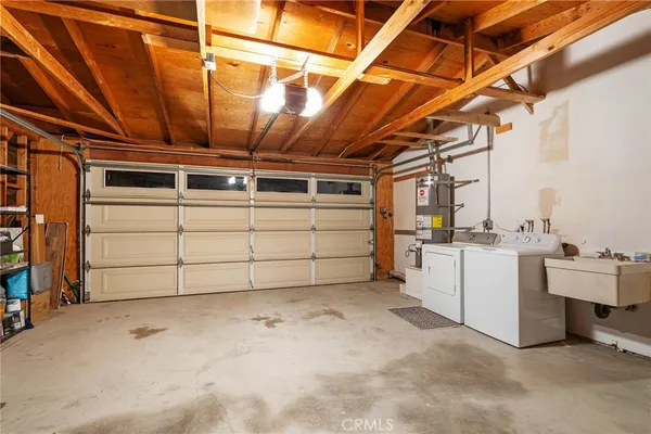 a view of a garage room with washing machine