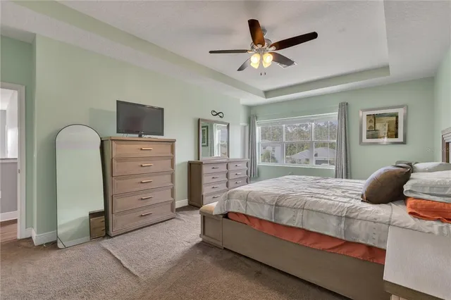 an aerial view of residential houses with outdoor space and street view