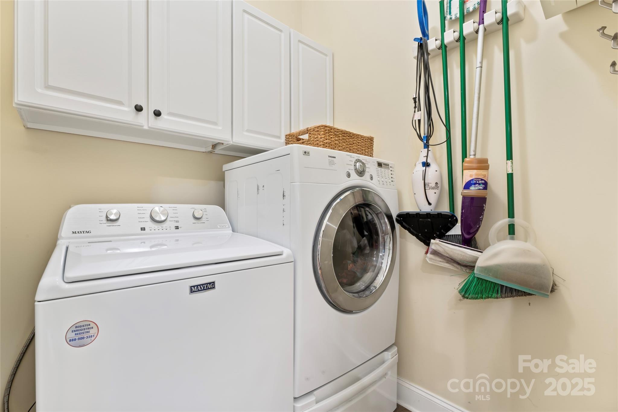 331 Miners Cove Way Fort Mill, SC 29708 - Photo 29 of 47 a utility room with dryer and washer