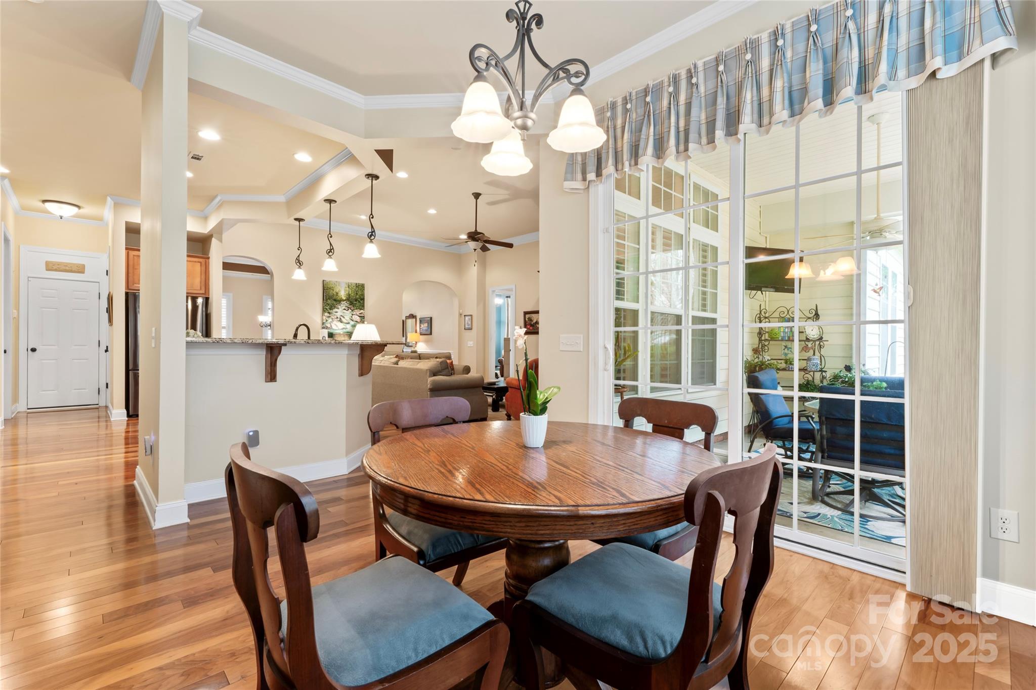 331 Miners Cove Way Fort Mill, SC 29708 - Photo 33 of 47 a dining room with furniture and wooden floor