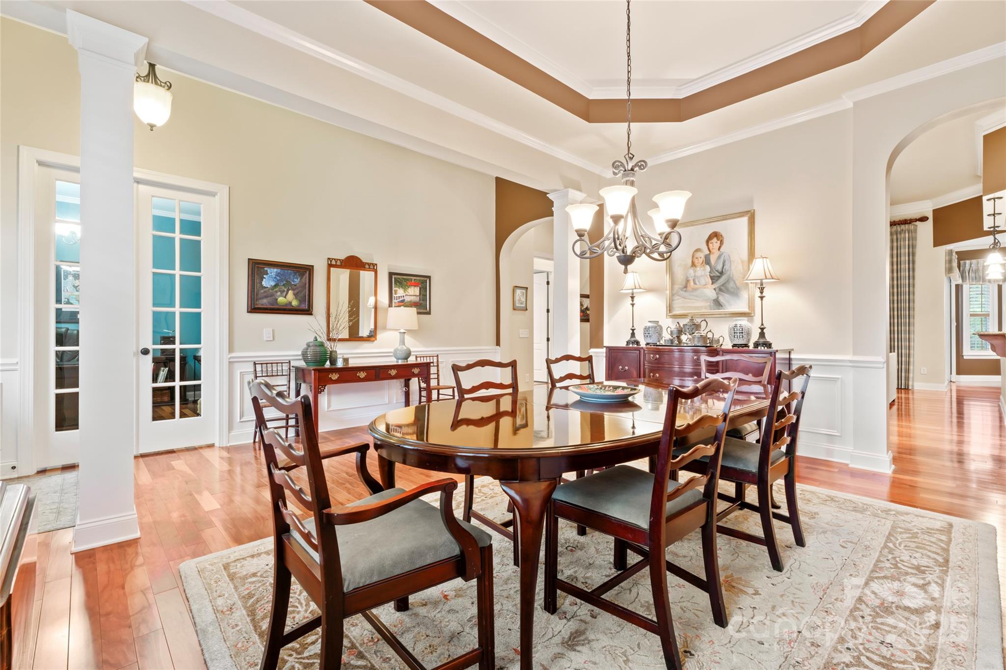 331 Miners Cove Way Fort Mill, SC 29708 - Photo 8 of 47 a view of a dining room with furniture and chandelier