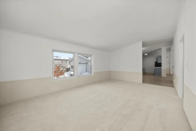 an empty room with window