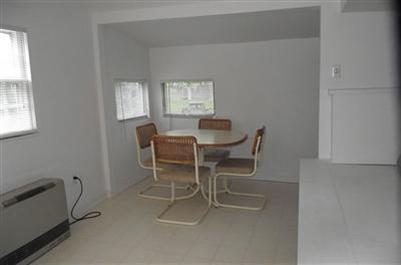 125 Shore Road, Unit 11 Truro, MA 02666 - Photo 3 of 8 a dining room with furniture and window