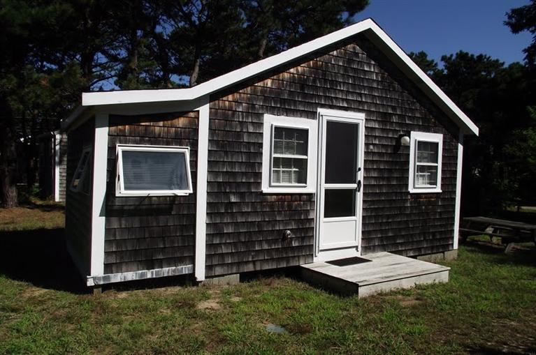125 Shore Road, Unit 11 Truro, MA 02666 - Photo 6 of 8 a front view of a house with garden