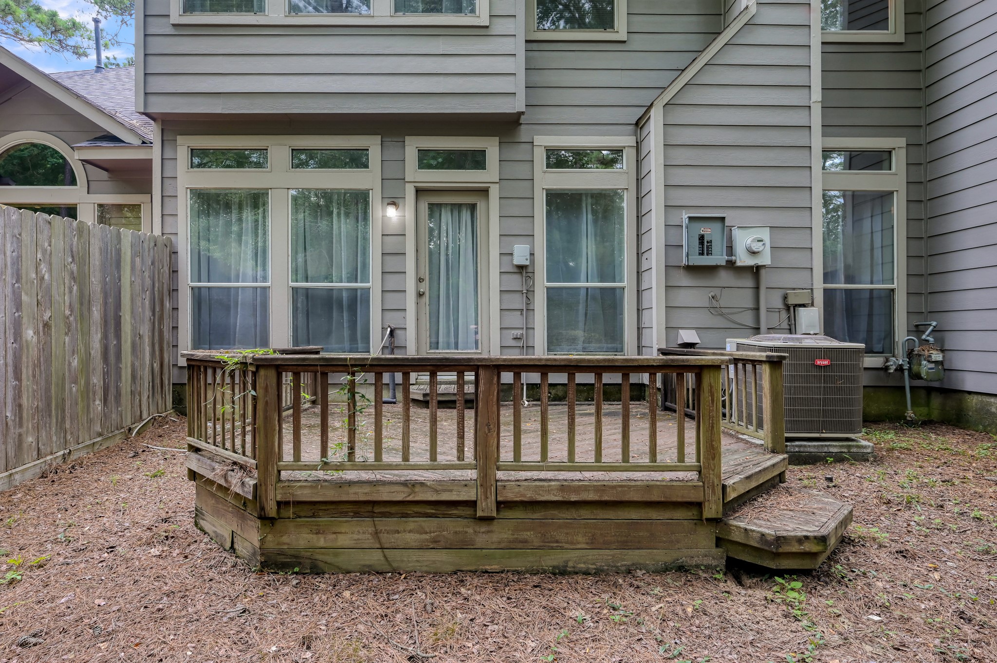23 Alderon Woods Place Spring, TX 77382 - Photo 24 of 25 a view of a chair with a small yard