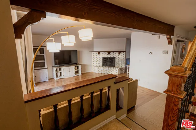 a kitchen with stainless steel appliances granite countertop a sink and a stove