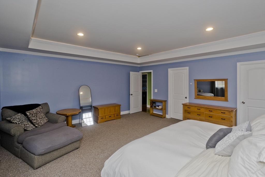 48 Mountain Avenue West Springfield, MA 01089 - Photo 18 of 39 a bedroom with furniture and a flat screen tv