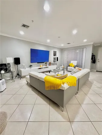 a bed room with a bed and a television