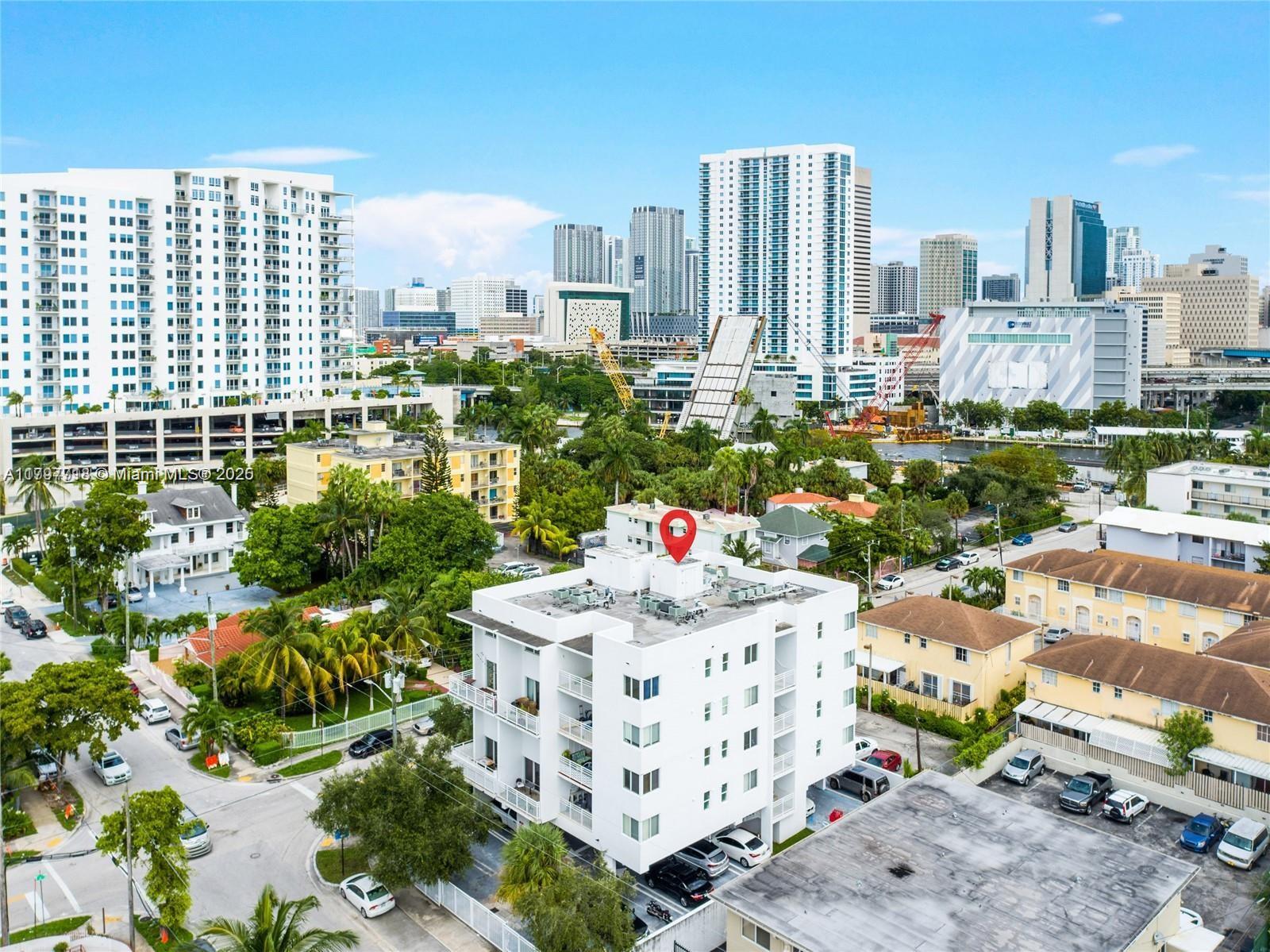 498 Southwest 2nd Street, Unit 2D Miami, FL 33130 - Photo 1 of 35 a city view with tall buildings