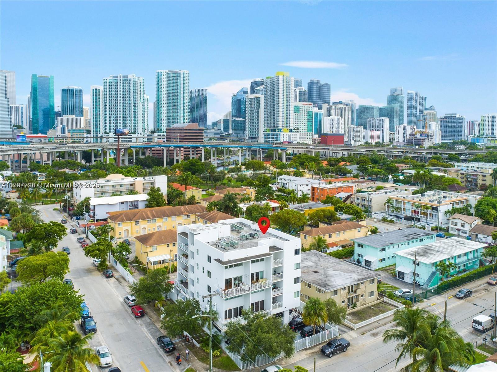498 Southwest 2nd Street, Unit 2D Miami, FL 33130 - Photo 2 of 35 a view of city and a tall buildings