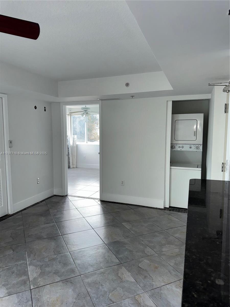498 Southwest 2nd Street, Unit 2D Miami, FL 33130 - Photo 26 of 35 a view of a livingroom with wooden floor and a cabinet