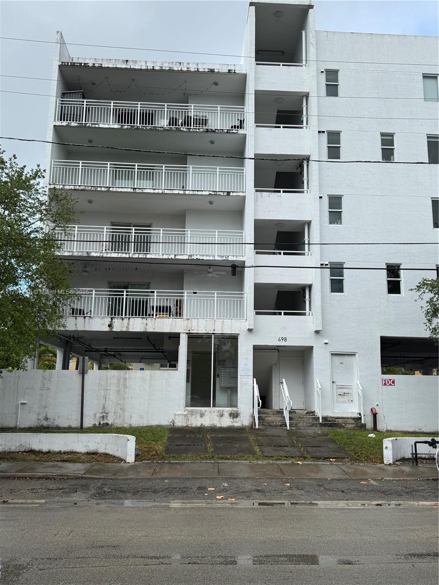 498 Southwest 2nd Street, Unit 2D Miami, FL 33130 - Photo 3 of 35 a front view of a building with a street