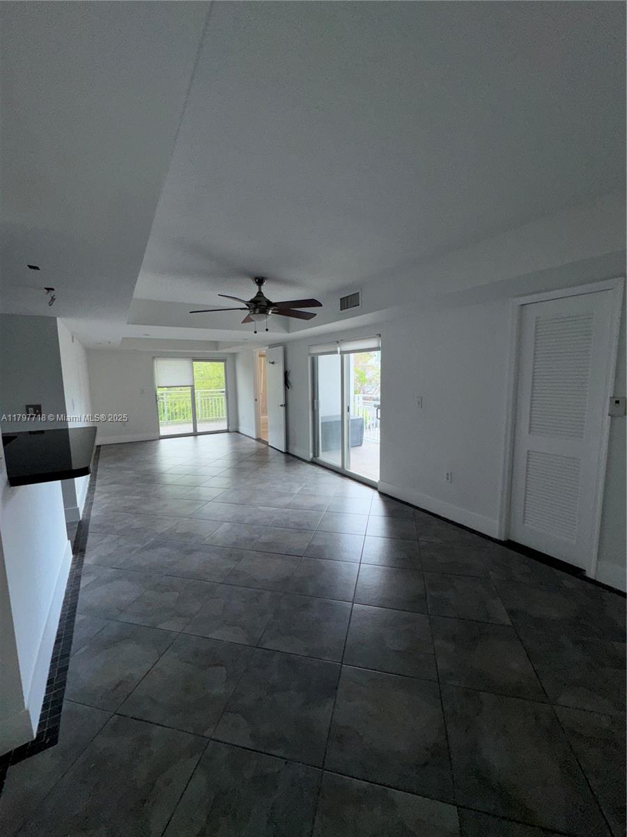 498 Southwest 2nd Street, Unit 2D Miami, FL 33130 - Photo 7 of 35 a view of an empty room and window