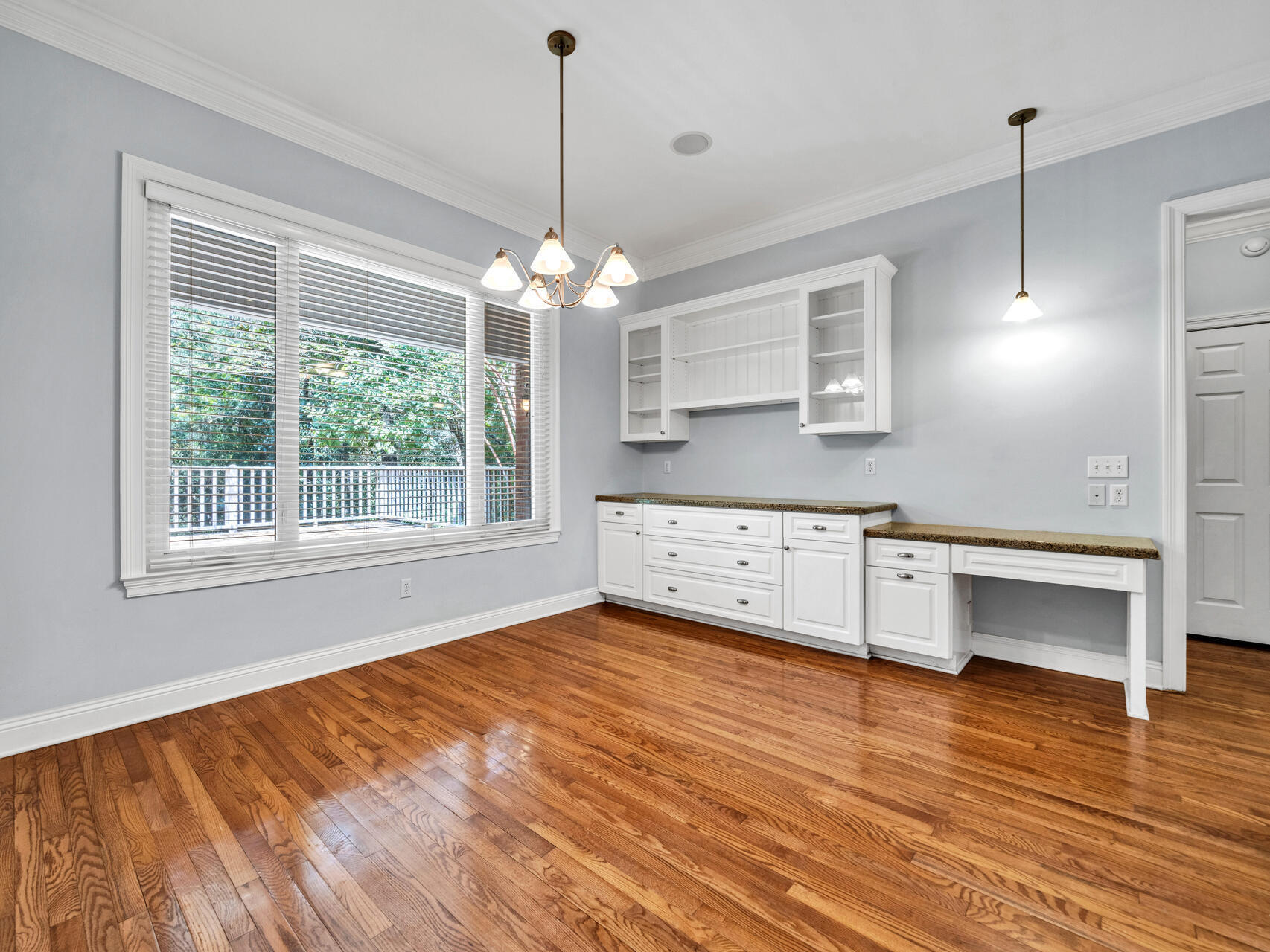 145 Mulry Drive Niceville, FL 32578 - Photo 15 of 58 a view of a room with wooden floor and a window