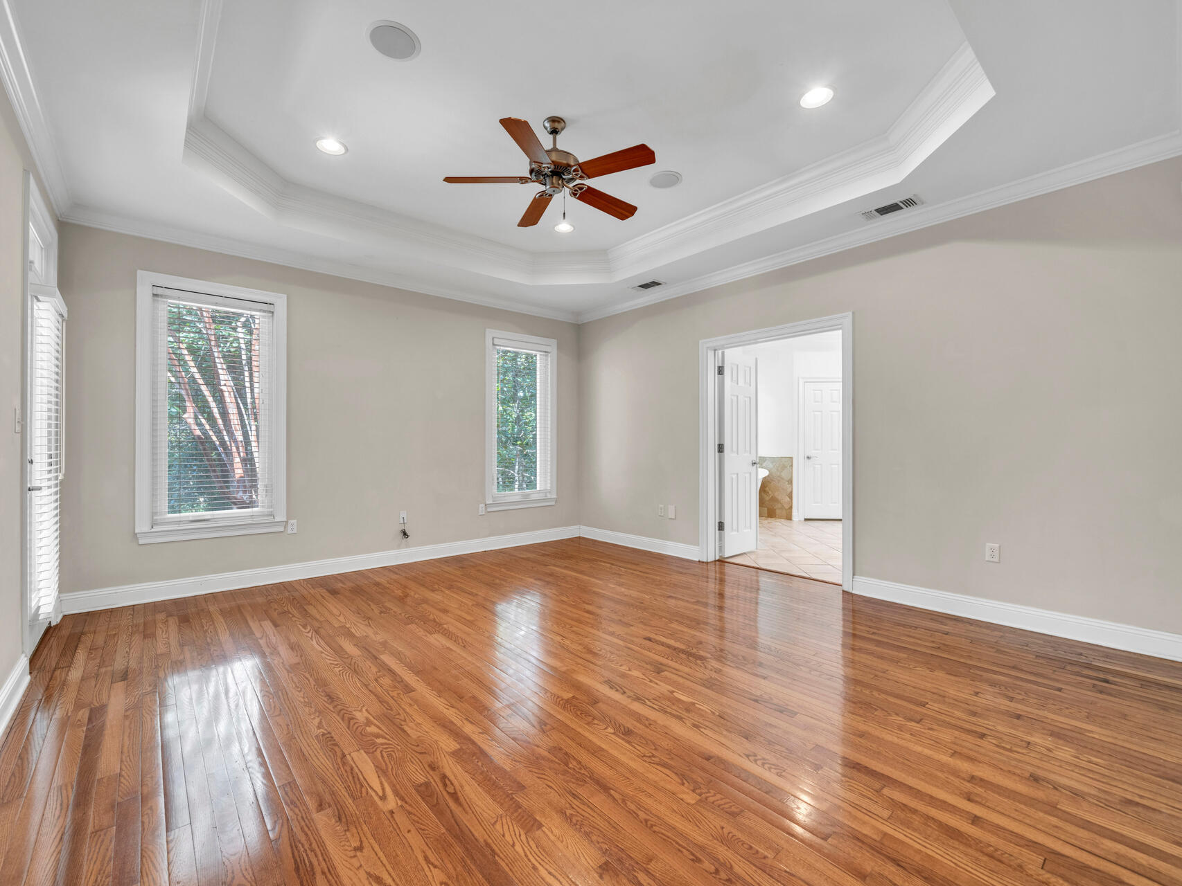 145 Mulry Drive Niceville, FL 32578 - Photo 25 of 58 a view of empty room with wooden floor and fan