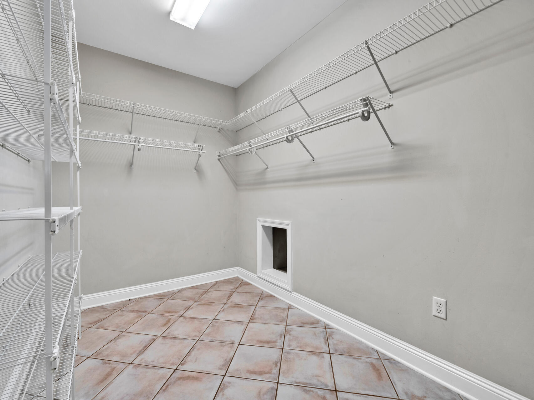 145 Mulry Drive Niceville, FL 32578 - Photo 34 of 58 a view of a room with racks on the wall