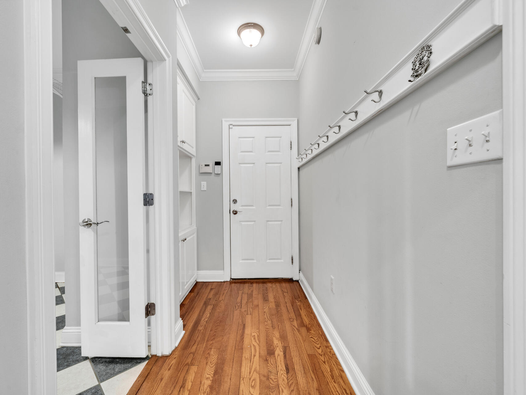 145 Mulry Drive Niceville, FL 32578 - Photo 36 of 58 a view of a hallway with wooden floor and staircase