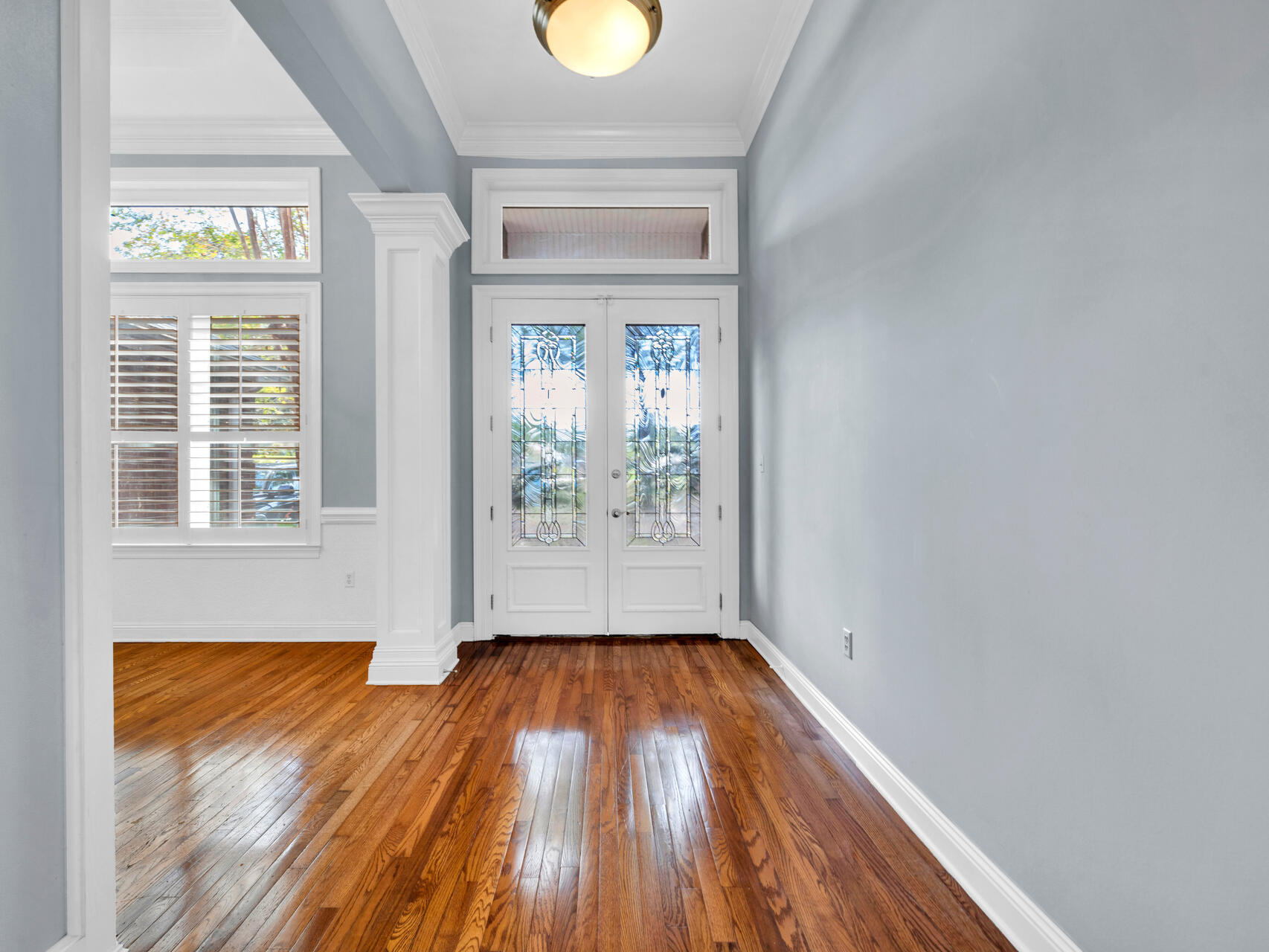 145 Mulry Drive Niceville, FL 32578 - Photo 4 of 58 a view of empty room with wooden floor and fan