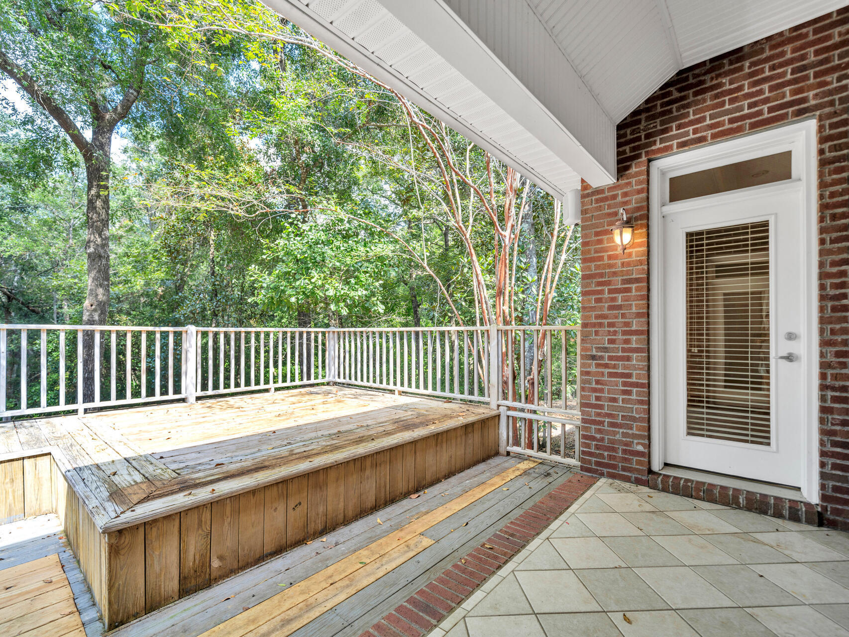 145 Mulry Drive Niceville, FL 32578 - Photo 46 of 58 a balcony with trees in front of it