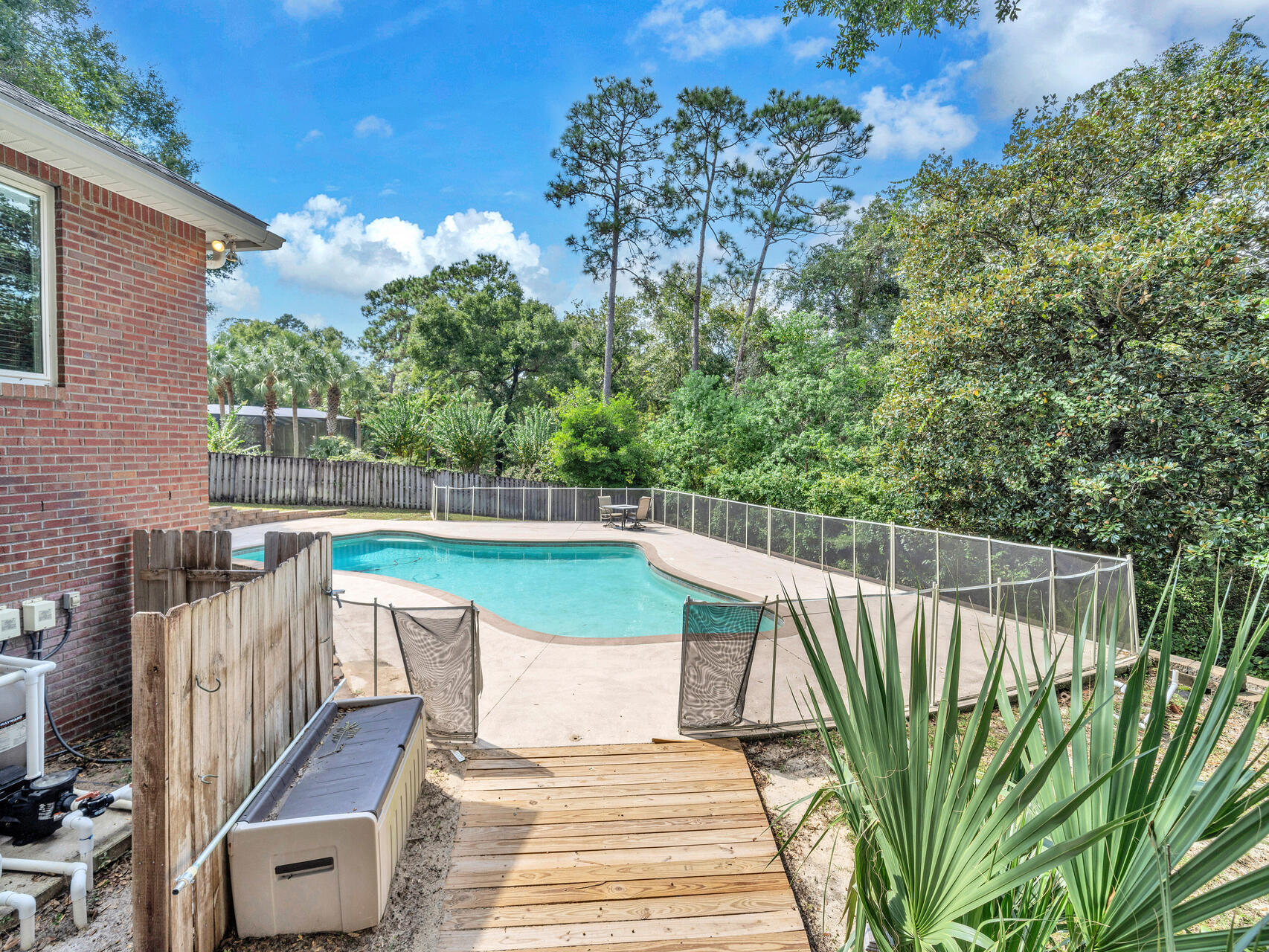 145 Mulry Drive Niceville, FL 32578 - Photo 49 of 58 a view of balcony with wooden floor and outdoor seating