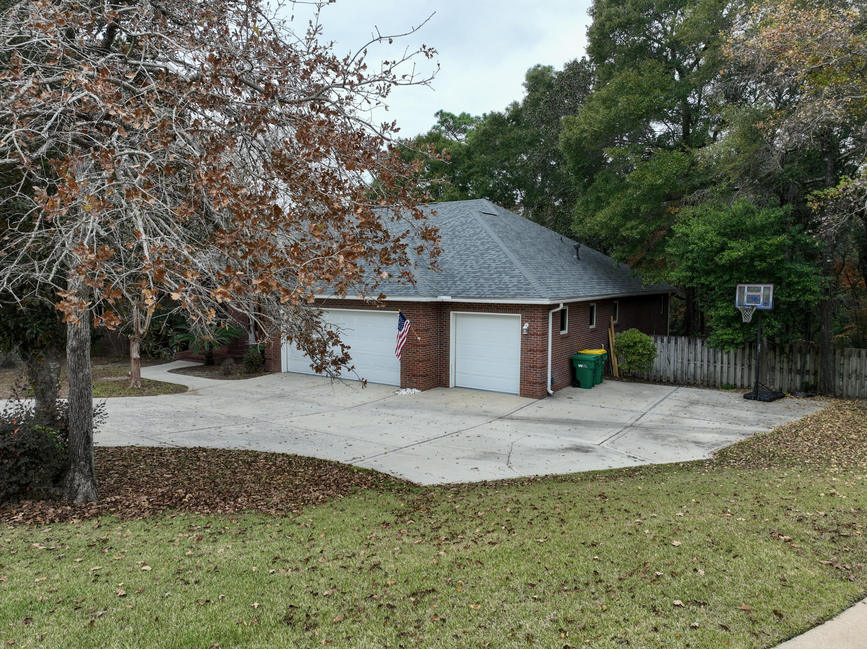 145 Mulry Drive Niceville, FL 32578 - Photo 57 of 58 a house that has a tree in front of it