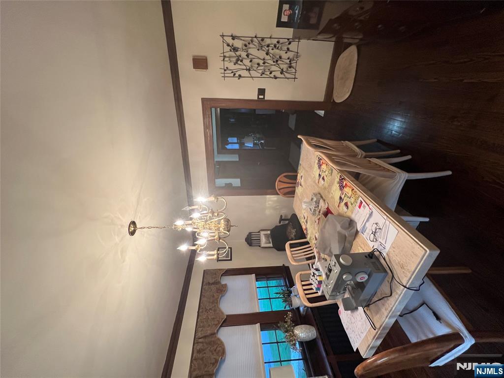 26 Wayne Street Montvale, NJ 07645 - Photo 11 of 32 a view of a dining room with furniture and chandelier