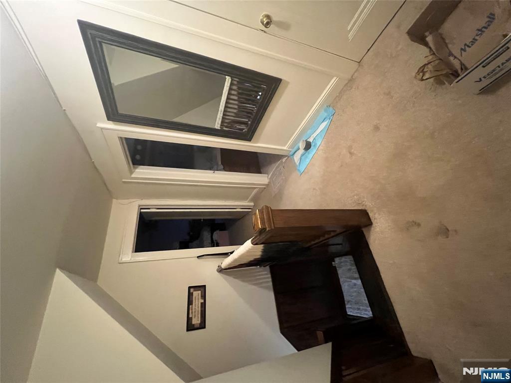 26 Wayne Street Montvale, NJ 07645 - Photo 27 of 32 a living room with furniture and a window