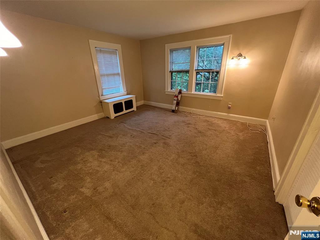 26 Wayne Street Montvale, NJ 07645 - Photo 31 of 32 an empty room with windows