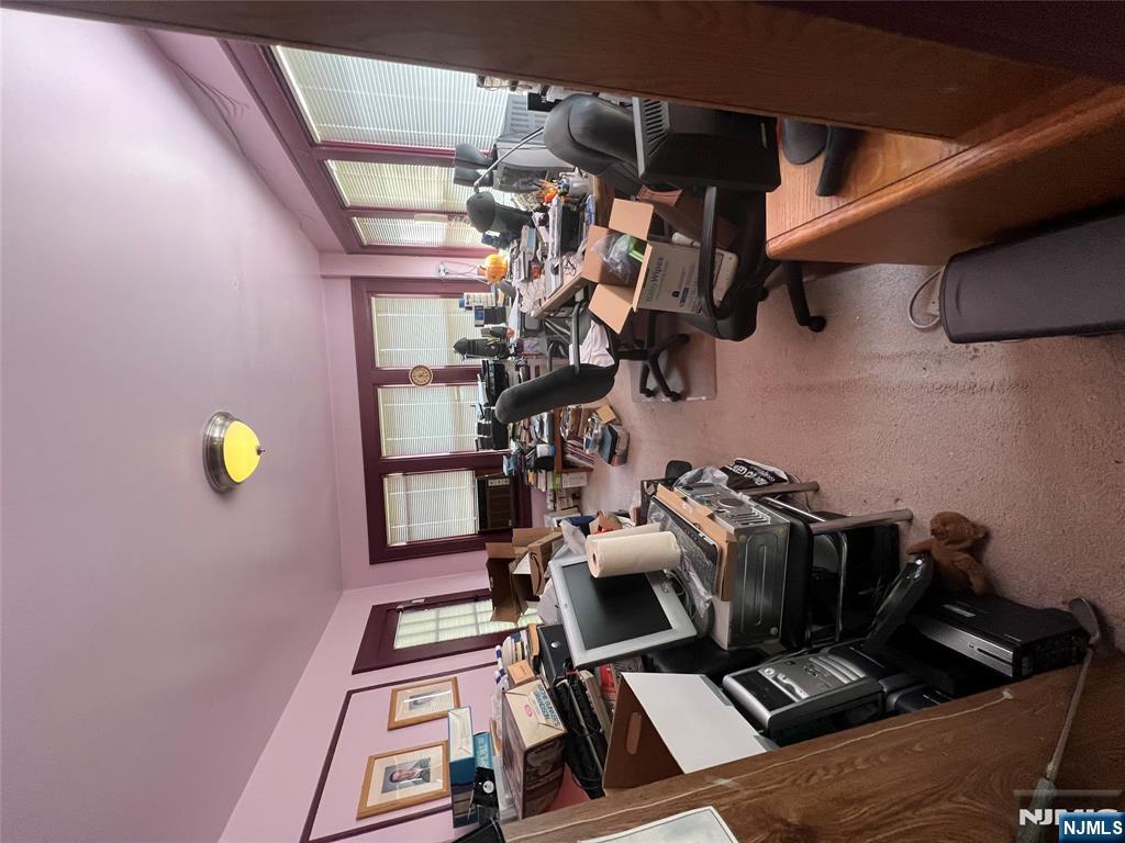 26 Wayne Street Montvale, NJ 07645 - Photo 8 of 32 a living room with furniture and a window