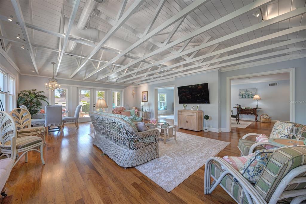 105 Riverside Drive Ormond Beach, FL 32176 - Photo 29 of 100 a living room with furniture and a flat screen tv