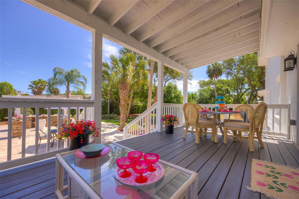 105 Riverside Drive Ormond Beach, FL 32176 - Photo 32 of 100 a view of a patio with furniture and garden