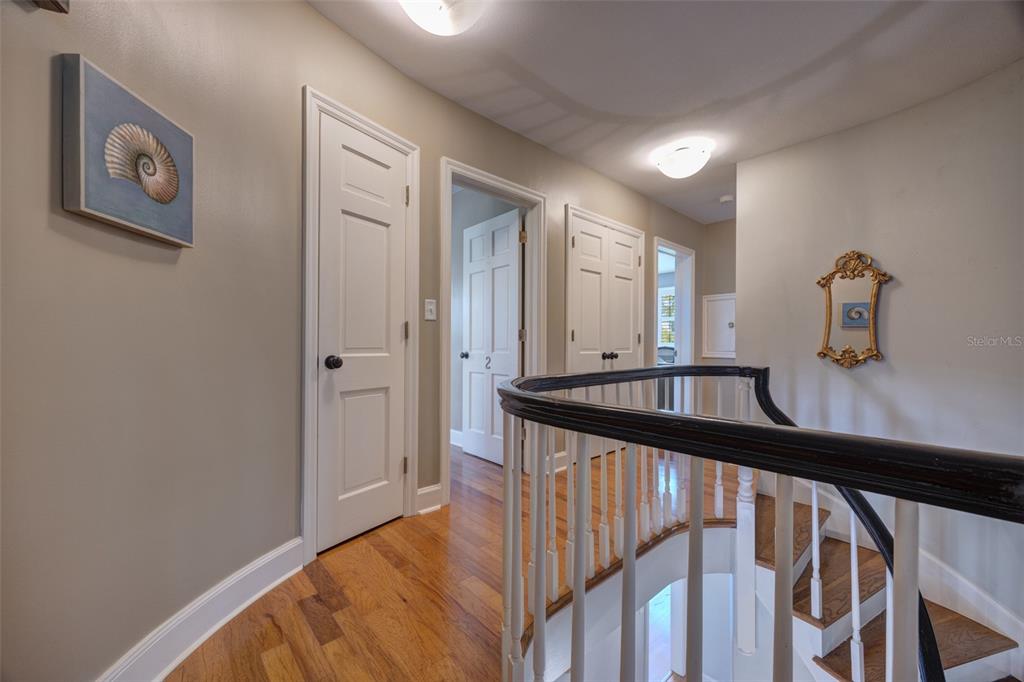 105 Riverside Drive Ormond Beach, FL 32176 - Photo 39 of 100 a view of a hallway view with staircase