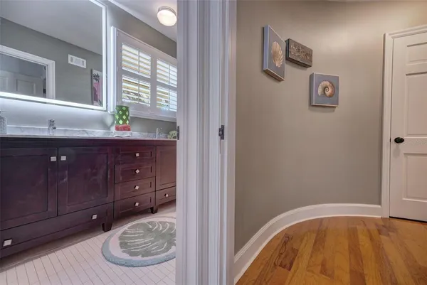 a view of empty room with wooden ceiling