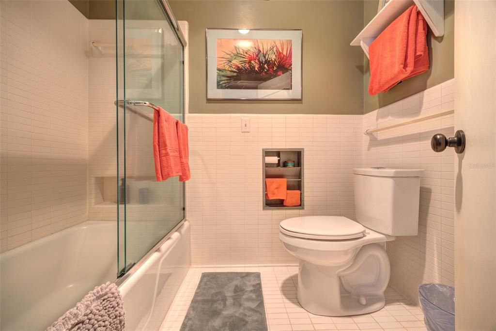 105 Riverside Drive Ormond Beach, FL 32176 - Photo 47 of 100 a bathroom with a toilet and a shower