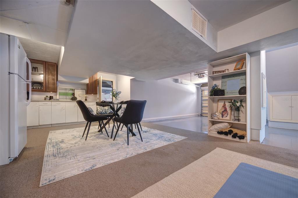 105 Riverside Drive Ormond Beach, FL 32176 - Photo 68 of 100 a view of a dining room with furniture and a table kitchen appliances
