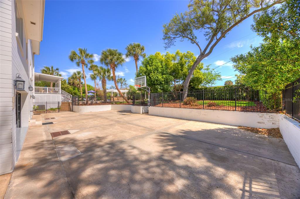 105 Riverside Drive Ormond Beach, FL 32176 - Photo 84 of 100 a view of road with palm trees
