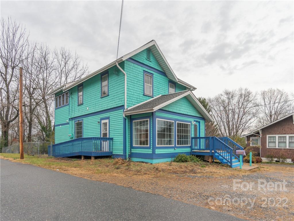 841 Haywood Road Asheville, NC 28806 - Photo 28 of 31 a front view of a house with a yard