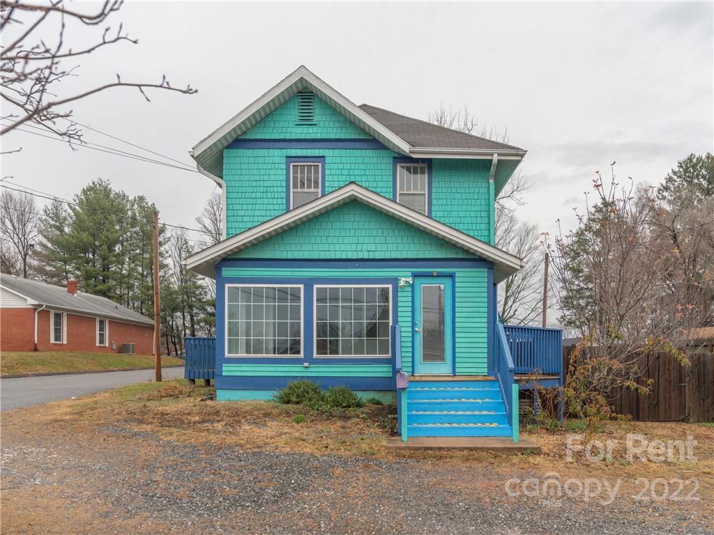 841 Haywood Road Asheville, NC 28806 - Photo 29 of 31 a front view of a house with a garden