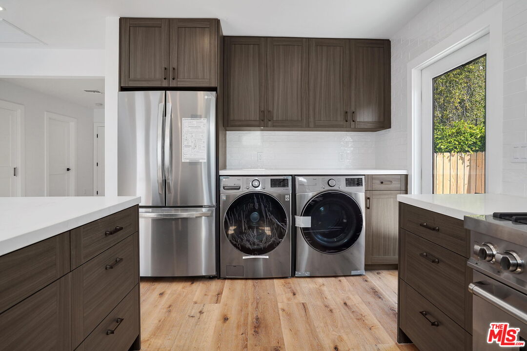 4130 Verdugo View Drive Los Angeles, CA 90065 - Photo 18 of 36 a utility room with sink dryer and washer