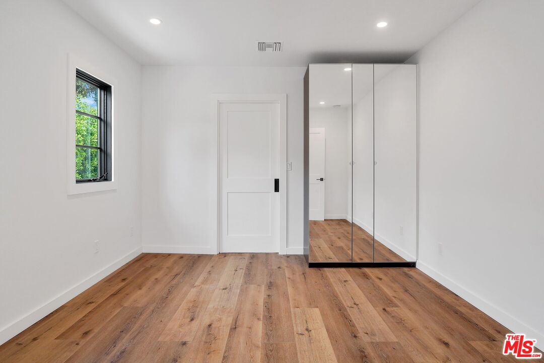 4130 Verdugo View Drive Los Angeles, CA 90065 - Photo 20 of 36 a view of room with wooden floor and entryway