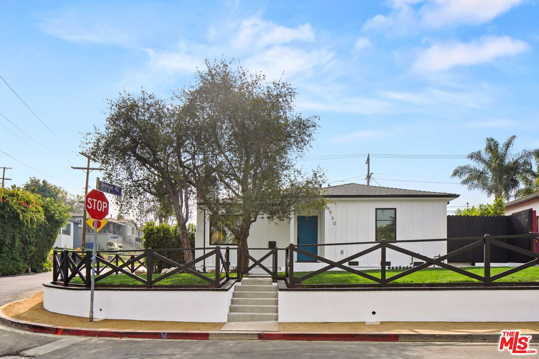 4130 Verdugo View Drive Los Angeles, CA 90065 - Photo 2 of 36 a view of a house with a yard and potted plants
