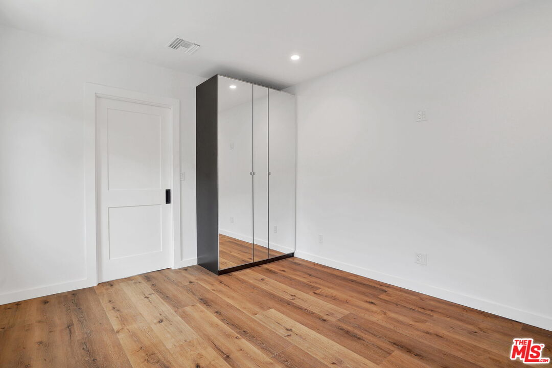 4130 Verdugo View Drive Los Angeles, CA 90065 - Photo 21 of 36 a view of empty room with wooden floor