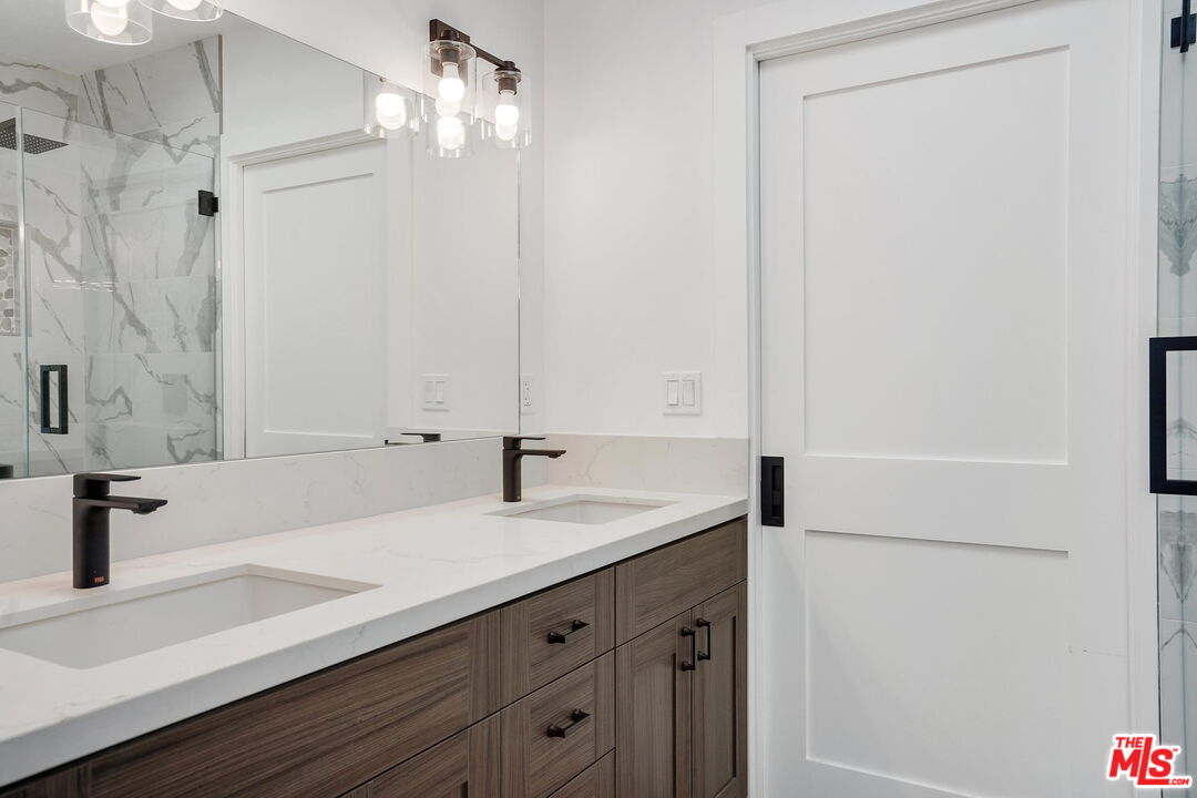4130 Verdugo View Drive Los Angeles, CA 90065 - Photo 24 of 36 a bathroom with a sink and a mirror