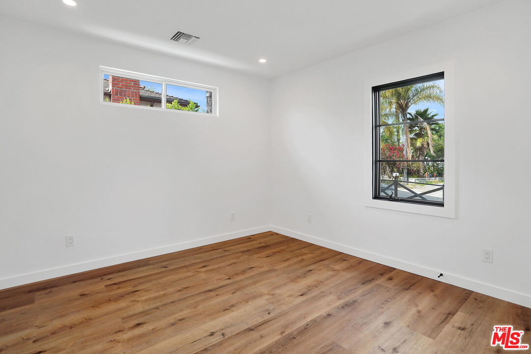 4130 Verdugo View Drive Los Angeles, CA 90065 - Photo 25 of 36 a view of empty room with wooden floor