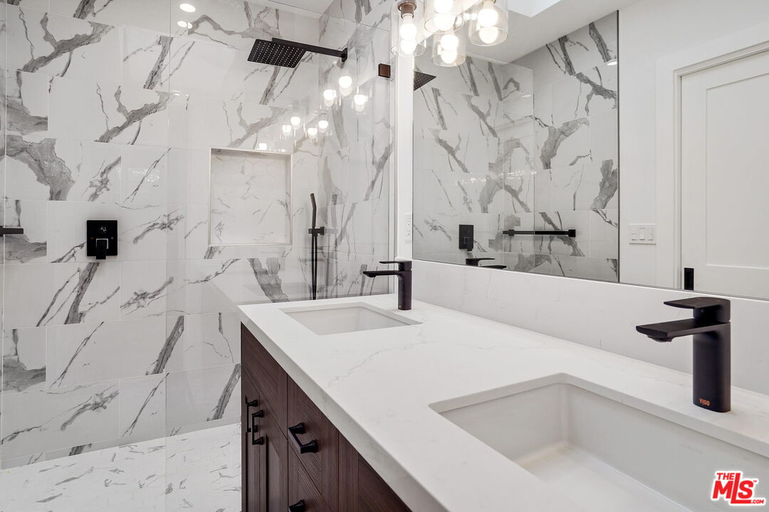 4130 Verdugo View Drive Los Angeles, CA 90065 - Photo 31 of 36 a bathroom with a sink and a bathtub